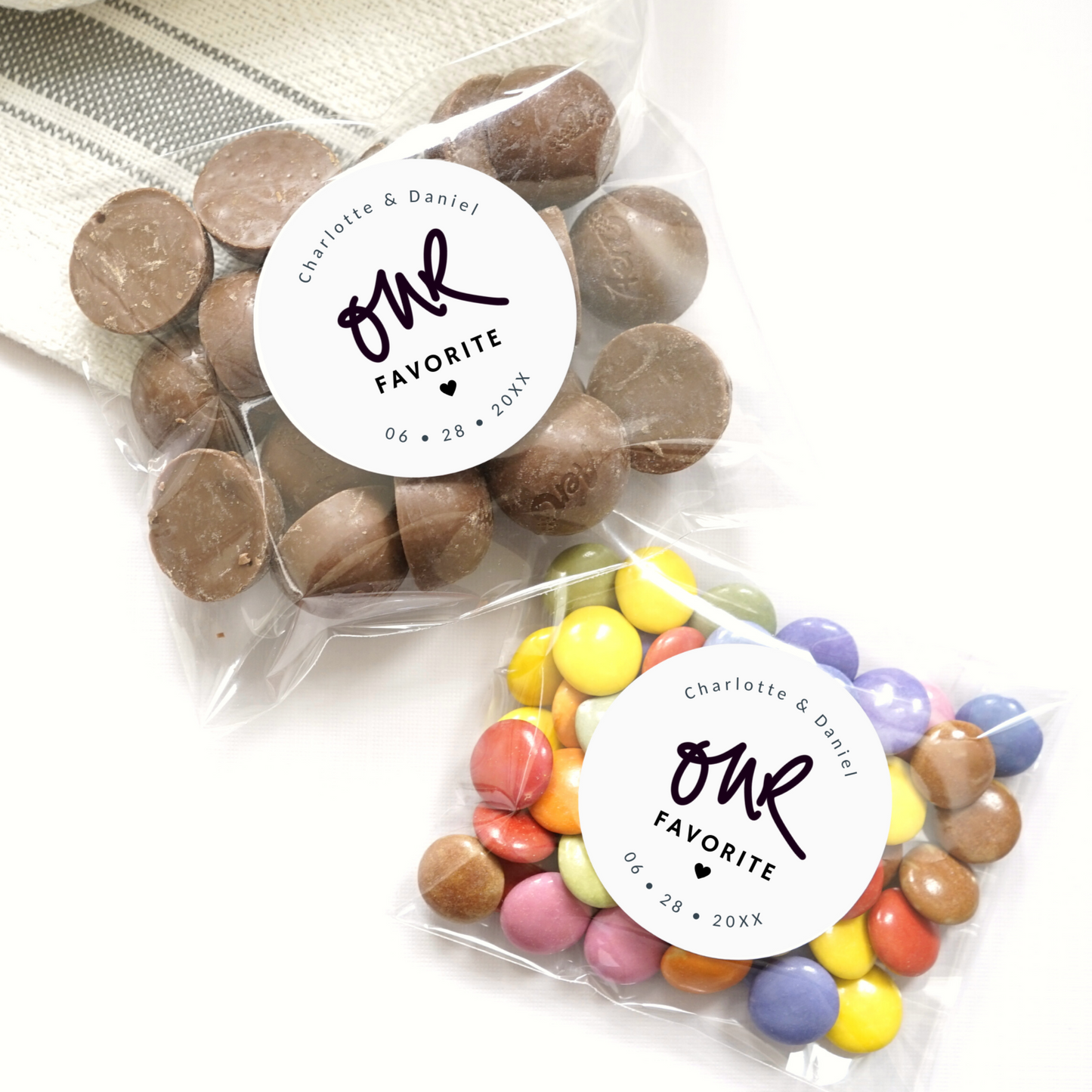 Personalized 2" round matte white stickers with "our favorite". 24 stickers per pack. Personalized with names and date. Example: Charlotte & Daniel 06.28.2024.