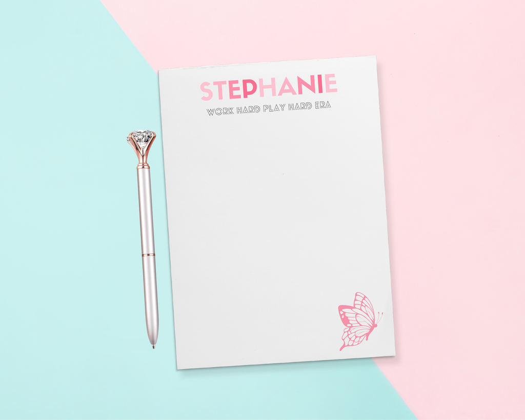We all know that person who loves Pop culture! Give a thoughtful and useful gift for someone to stay organized. Personalized notepads are exactly the gift they’d love. Choose the color combination for the recipient's name and custom slogan below - such as "Work Hard Play Hard Era".