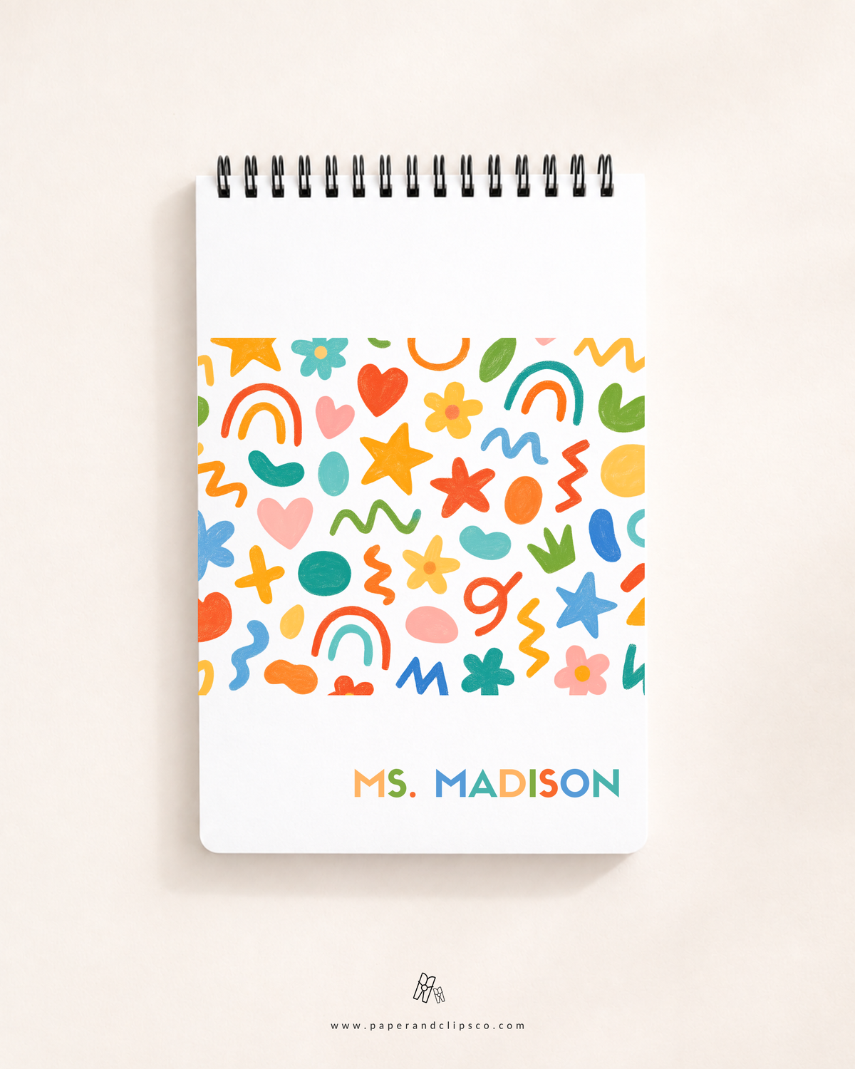 Soft cover personalized 48-page top-spiral teacher daily planner with colorful doodle design and custom text.
