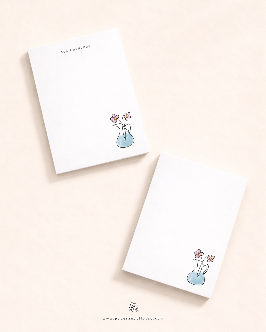 Personalized floral notepad with custom name and minimalist vase flower illustration on a clean white stationery pad.